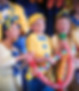 This photo links to the Saint Nicholas Catholic School Admissions page. The image depicts three students, dressed in bright yellow and blue, in the Saint Nicholas School Spring Musical, Suessical Jr.