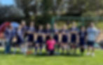 A group photo of a 7th and 8th grade girls soccer team at Saint Nicholas Catholic School in Los Altos California