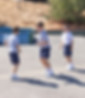 Tour and Open Houses Link; click to learn more about tours and open houses at Saint Nicholas Catholic School in Los Altos, California. The image depicts three boys, students at Saint Nicholas School, outside playing a game at recess.