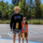 This image links to the Saint Nicholas Catholic School Student Life page. It depicts two students walking at the St. Nicholas School Walkathon.