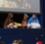 The photo links to the Saint Nicholas Catholic School Student Connections page. It depicts students acting out the Nativity at the Saint Nicholas School Advent Prayer Service.