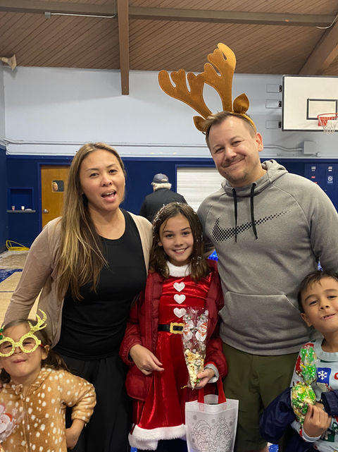 A family gets in the holiday spirit at our annual Winter Wonderland celebration.