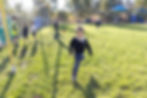 A link to Saint Nicholas Catholic School's Admission Policy page. The image shows a boy running during recess at Saint Nicholas School in Los Altos, California