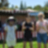This image links to the Saint Nicholas Catholic School in school connections page. It shows three students at the St. Nicholas School Carnival.