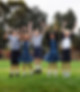 A link to the Apply Today Page for Saint Nicholas Catholic School in Los Altos California. The image depicts a group of elementary school students smiling and jumping outside at recess.