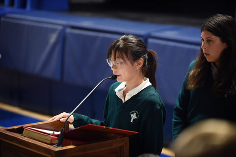 A student reading the prayers of the faithful at a school Mass at Saint Nicholas Catholic School, Los Altos, California