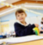 A kindergartener works on her classwork at Saint Nicholas Catholic School, in Los Altos California