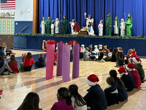 Students at Saint Nicholas Catholic School present a Nativity scene at the annual Advent Prayer Service at Saint Nicholas Catholic School in Los Altos, California